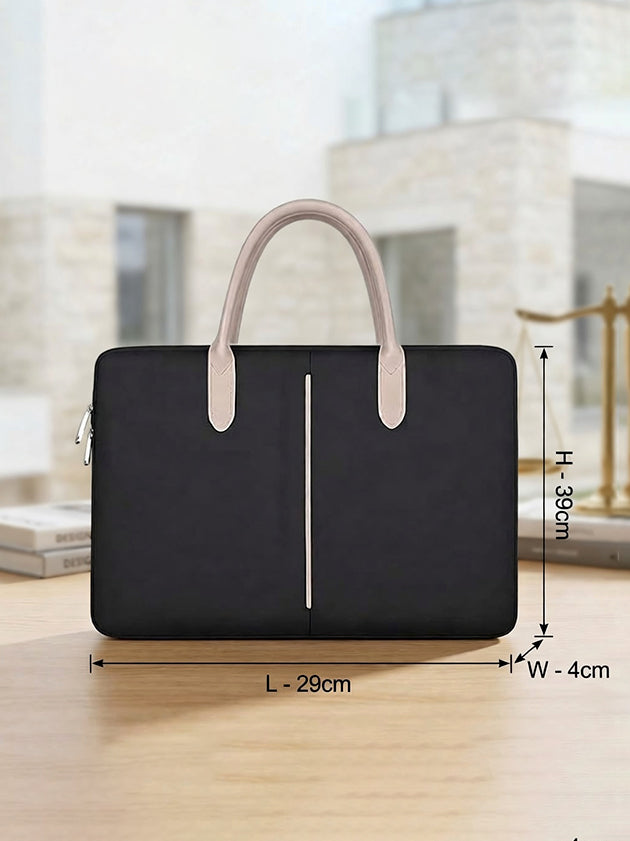 Travessary Handy Safe 14 inch laptop sleeve with dimensions displayed on a table.