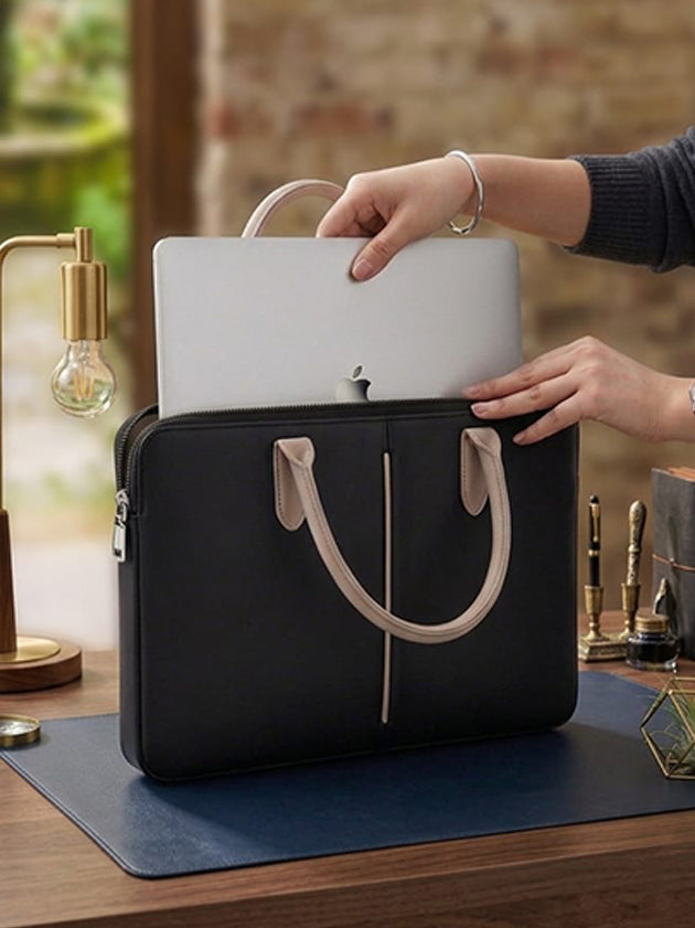 A person placing a 14 inch laptop sleeve on a desk, demonstrating its stylish design and functionality.
